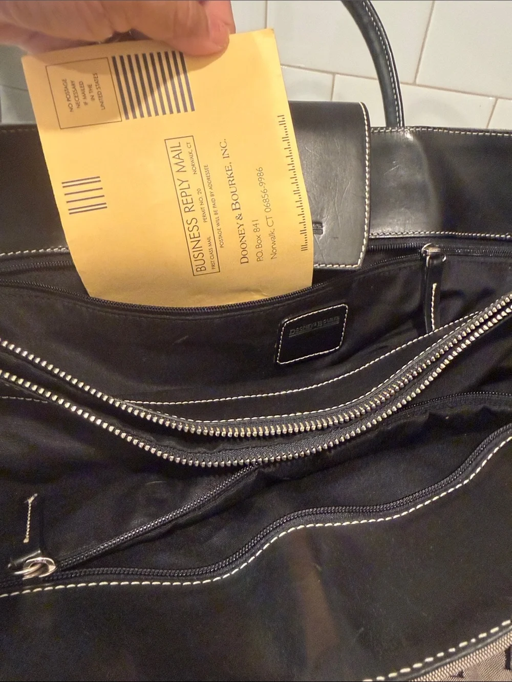 Dooney & Bourke Brown and Black Signature Duffel Bag
